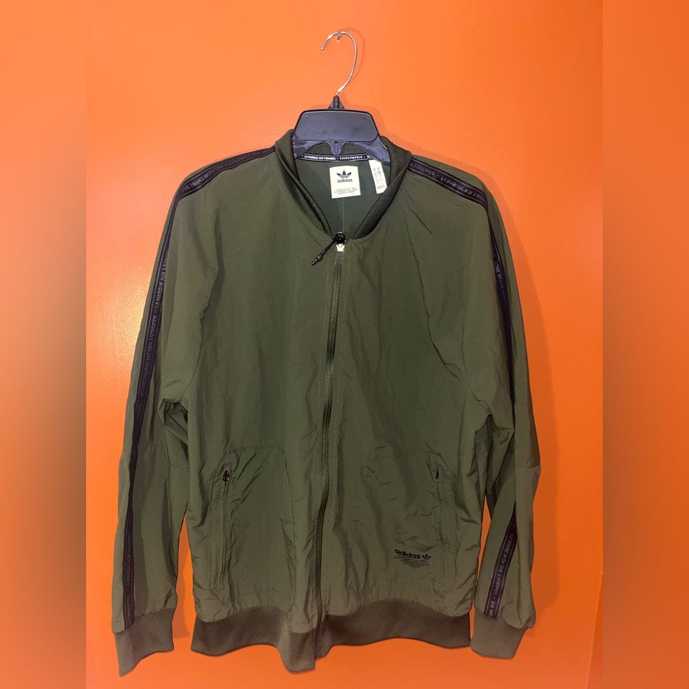 army green adidas jacket in a size large
